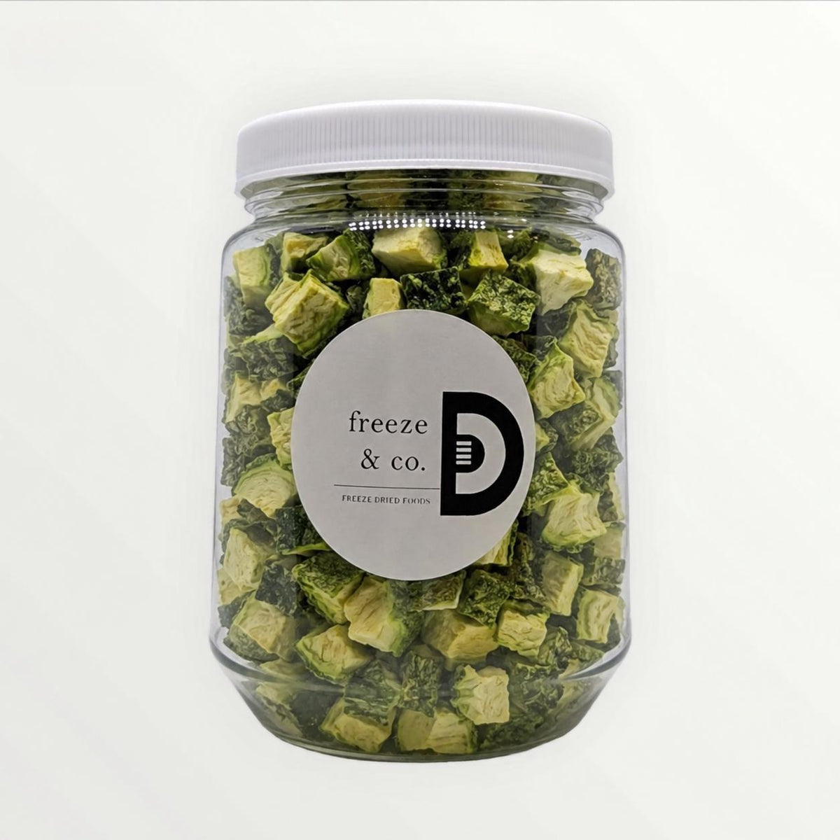 Freeze-dried zucchini chunks in a Freeze&co. jar